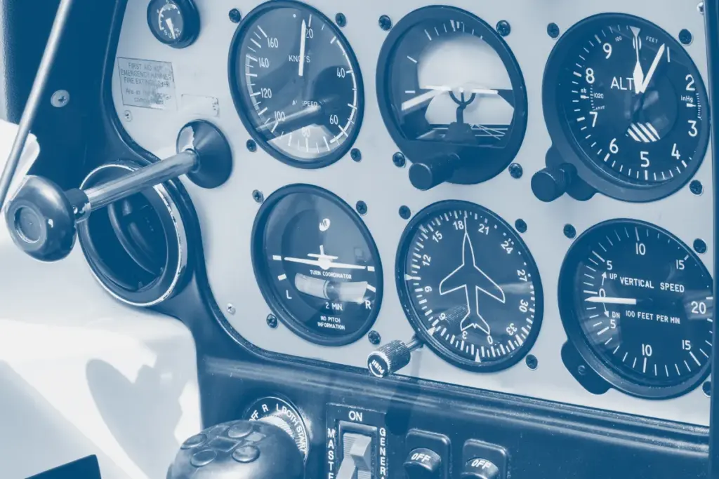 Aircraft engine gauge illustrating safety performance indicator monitoring